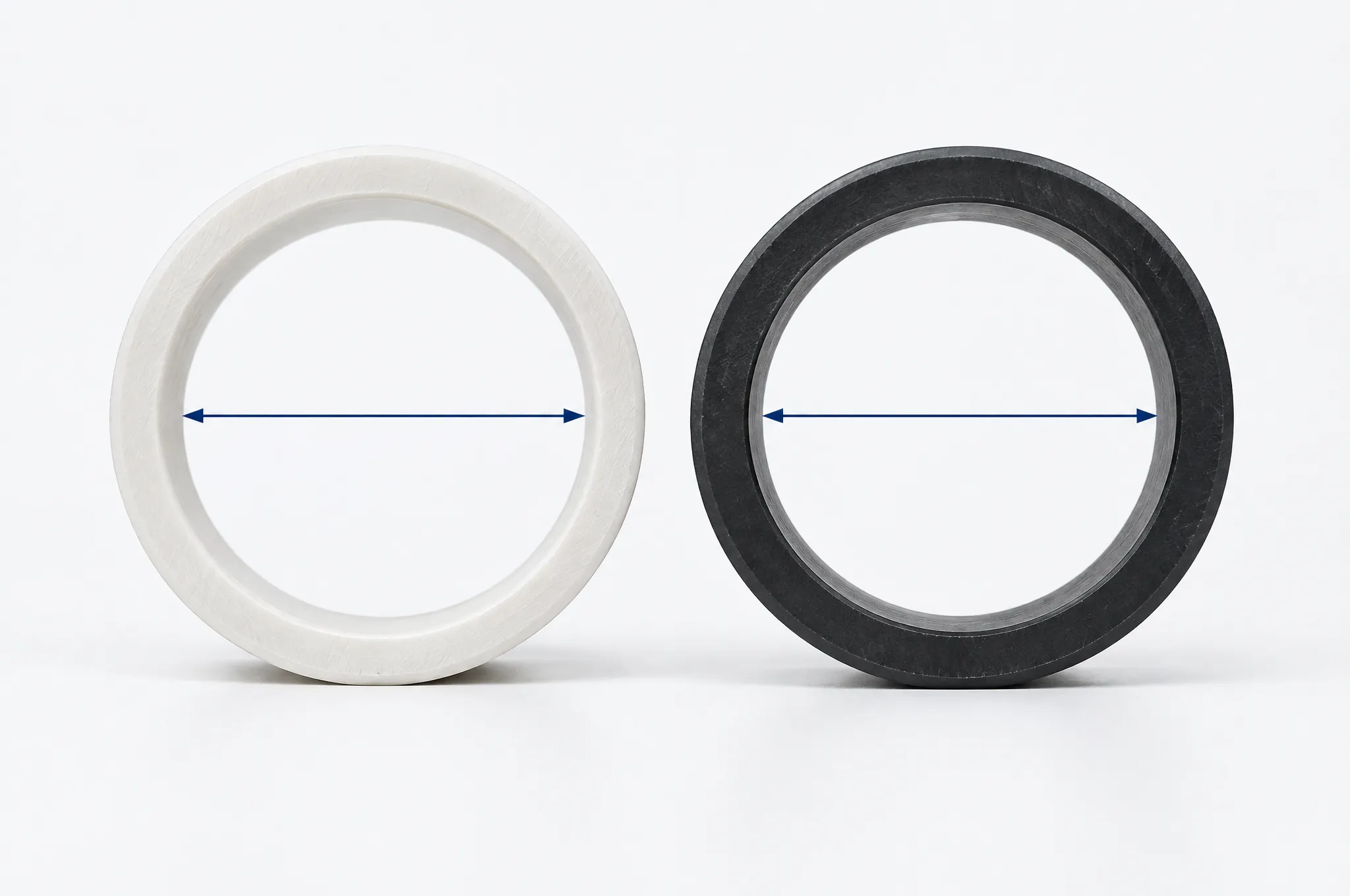 Illustration of two cut rings of thermoplastic pressure pipe at the same outside diameter: the thicker-walled black ring has a visibly narrower bore than the off-white ring